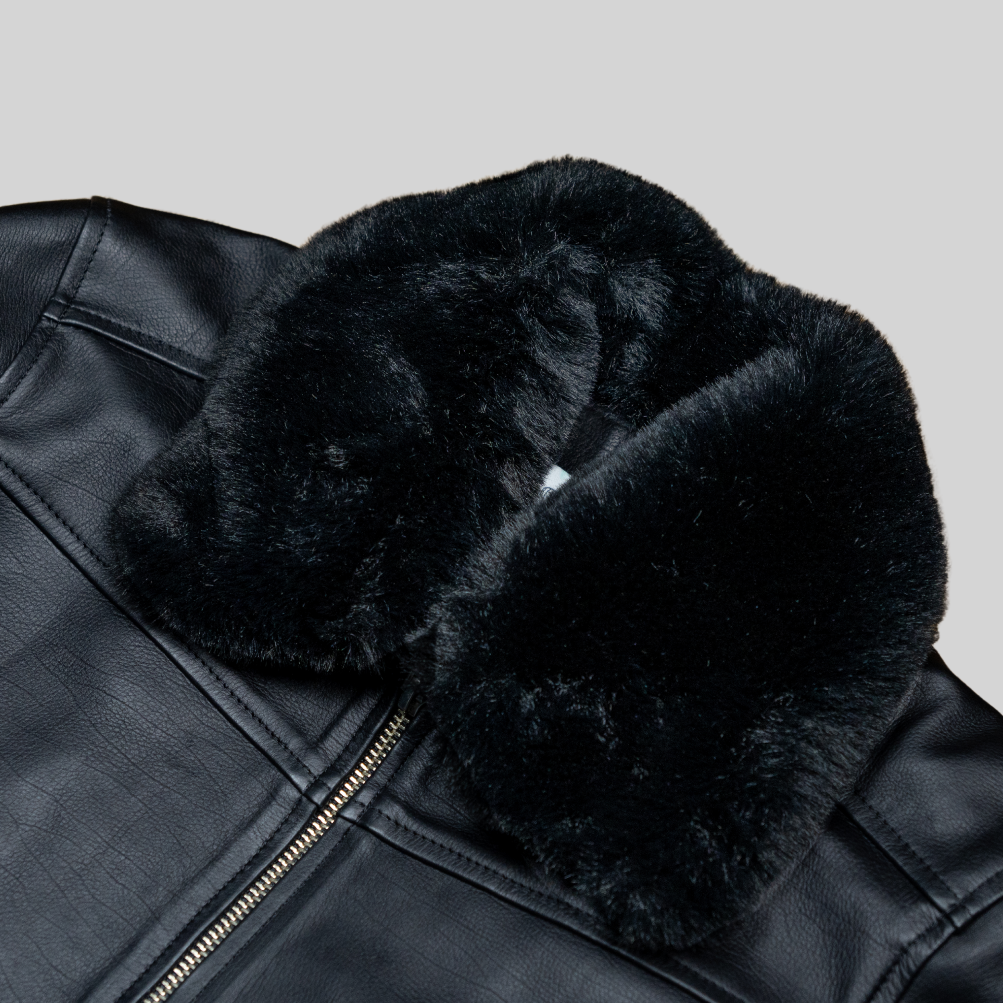 CHAQUETA EN CUERO CON OXFORD